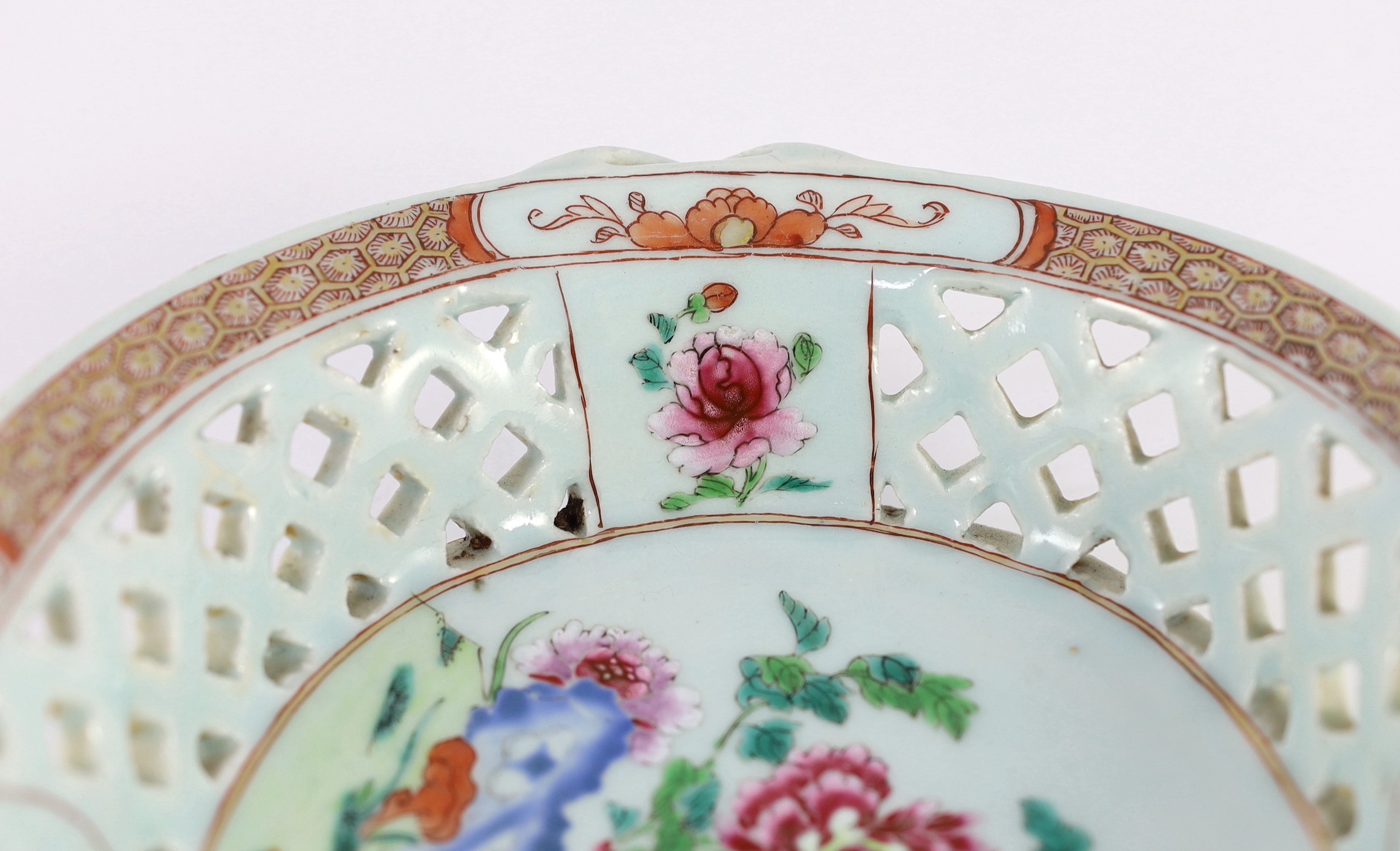 A Chinese famille rose oval two handled basket, Qianlong period, 31.5cm wide, chips to rim